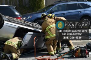 fire fighters help at scene of san diego car crash